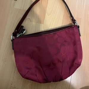 Really cute maroon never used Coach purse